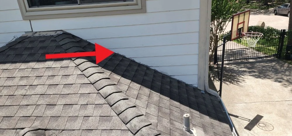 Residential siding and moisture detail photographed during field work